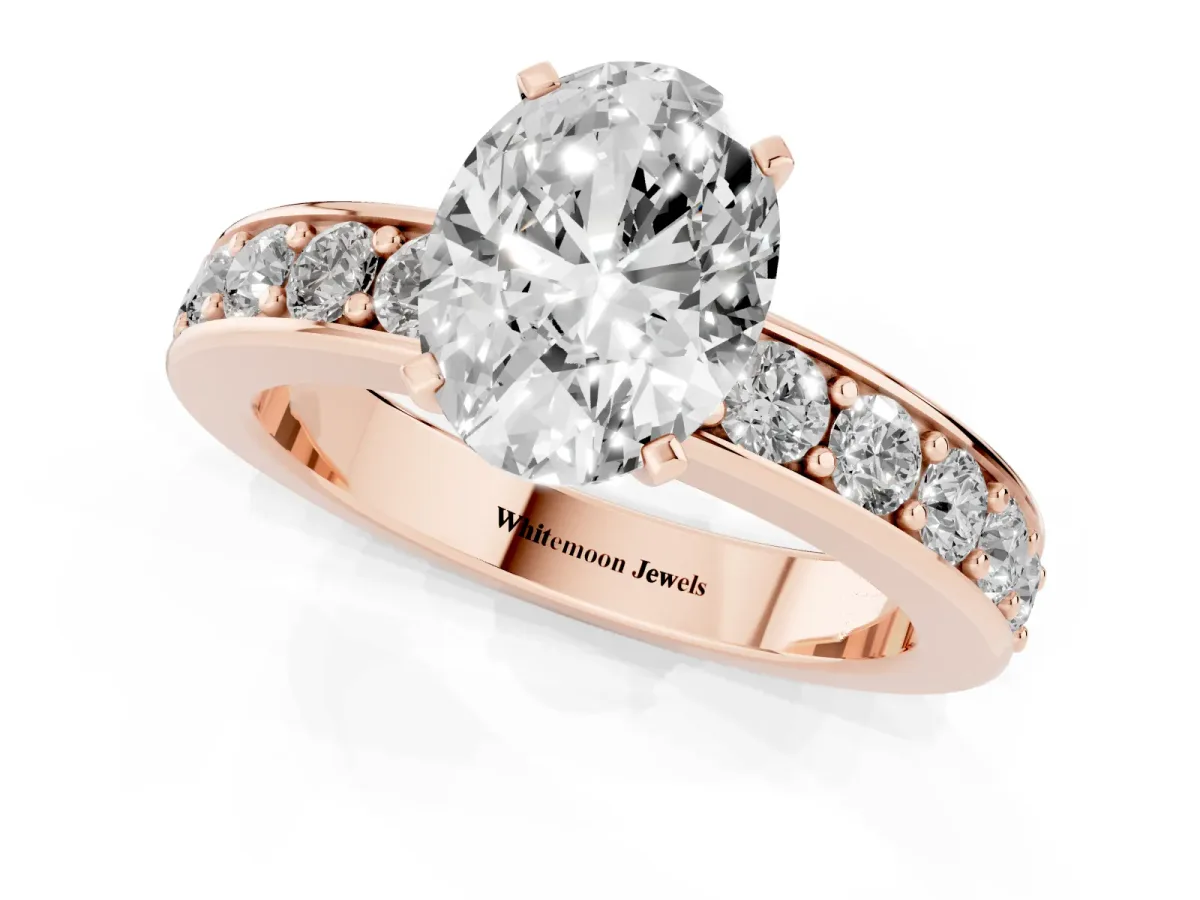 Oval Cut Diamond Engagement Ring with Channel Set Round Band and Prong Setting Rose gold