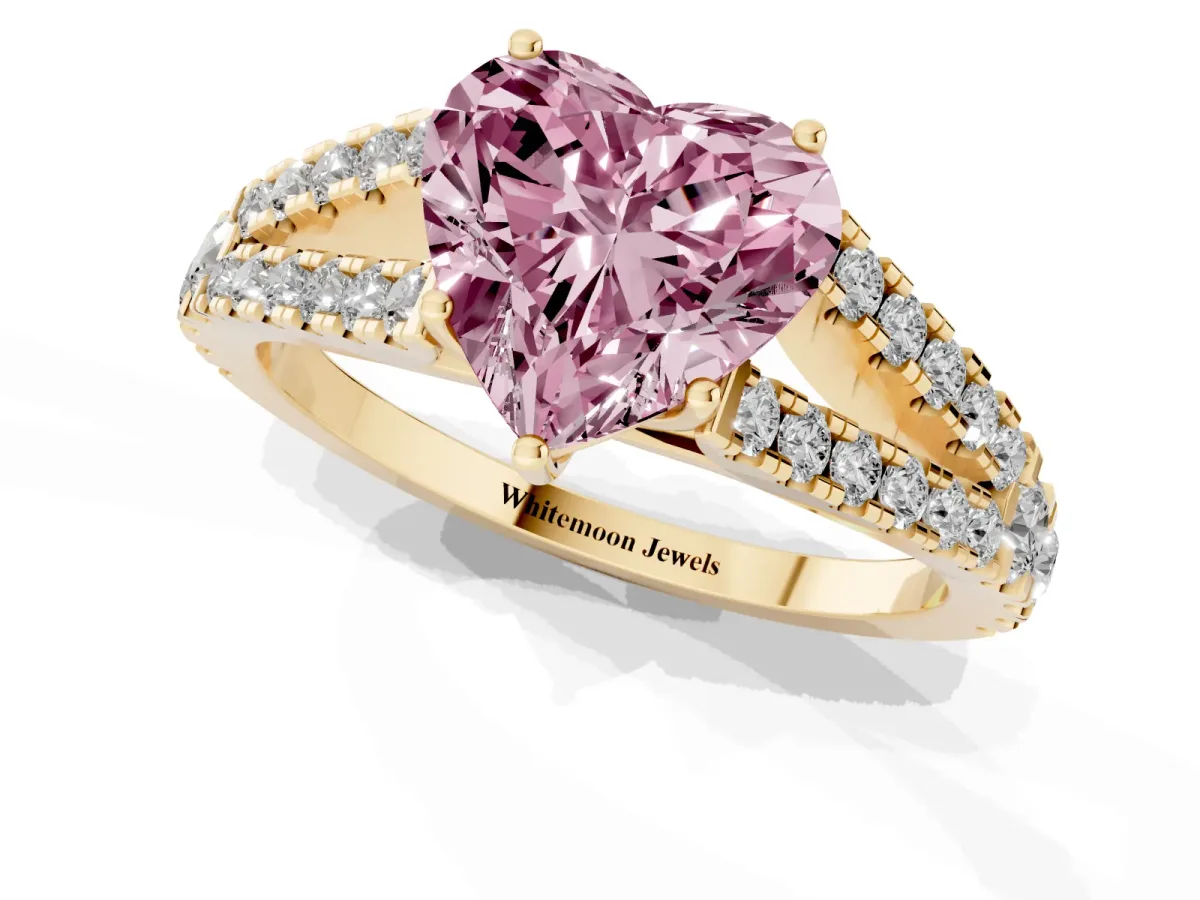 Fancy Pink Heart Cut Diamond Split Shank Pavé Engagement Ring with Four-Prong Setting Yellow gold