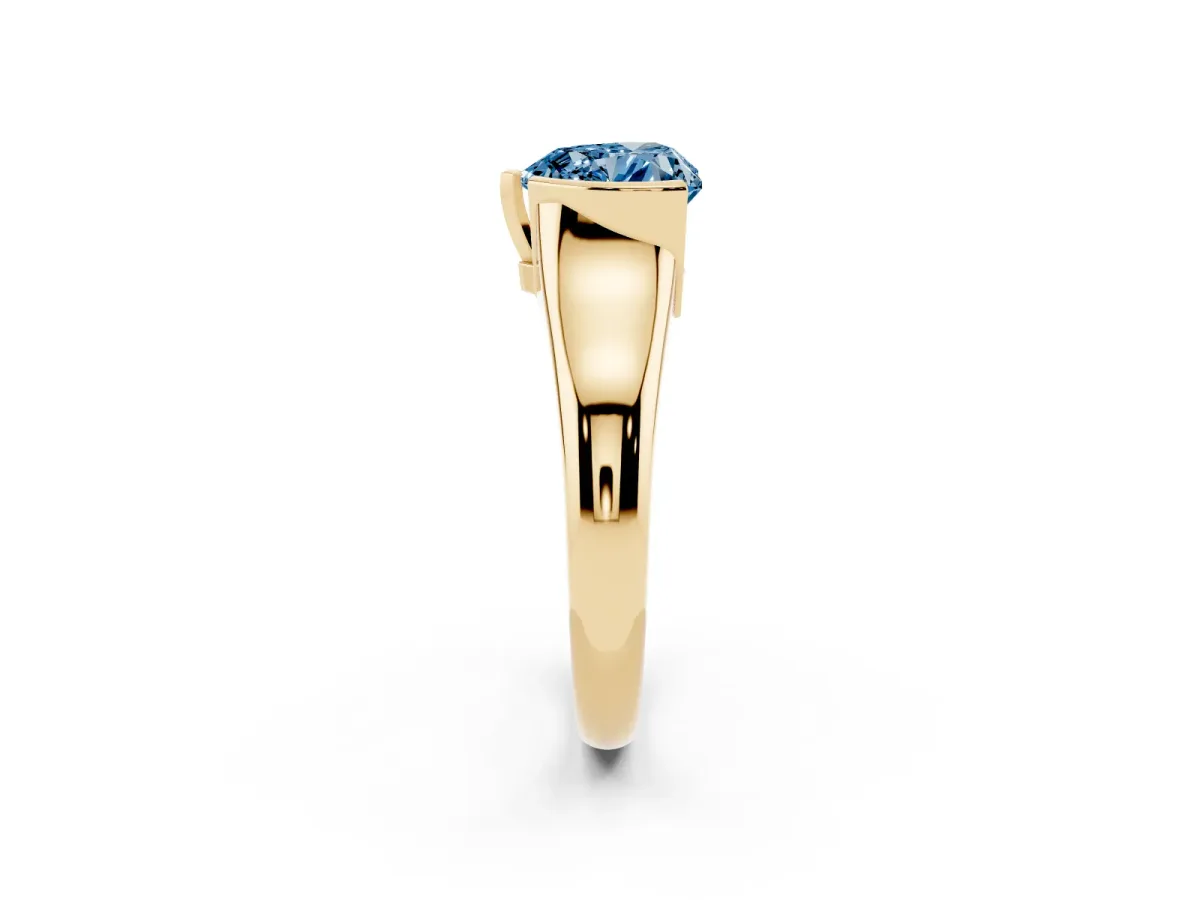 Fancy Blue Heart Cut Solitaire Tension Set Diamond Ring with Split Shank Band Yellow gold