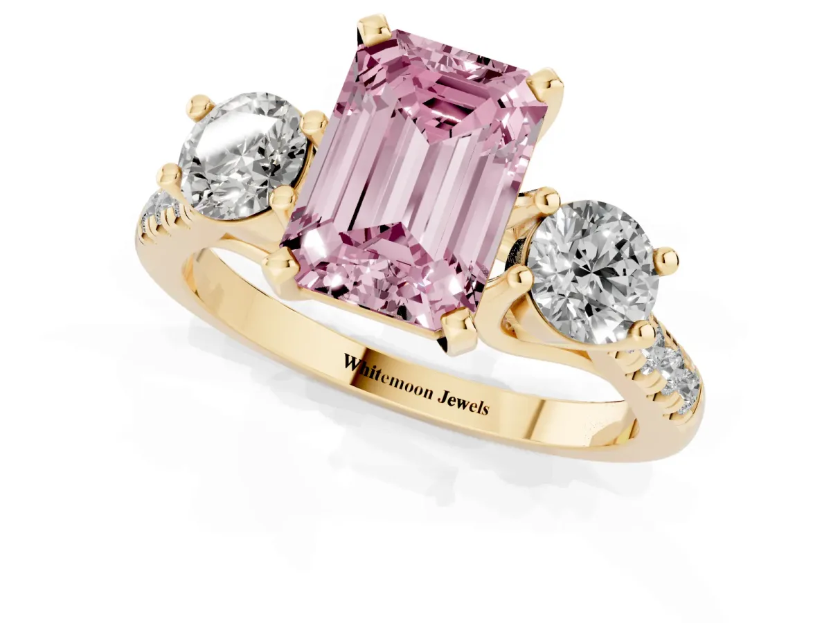 Fancy Pink Three-Stone Emerald Cut Diamond Pavé Band with Four-Prong Setting Yellow gold