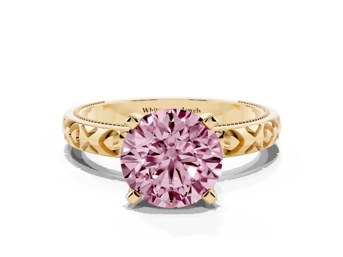 Fancy Pink Round Cut Solitaire Diamond Engagement Ring with XO Engraved Band and Four-Prong Setting Yellow gold