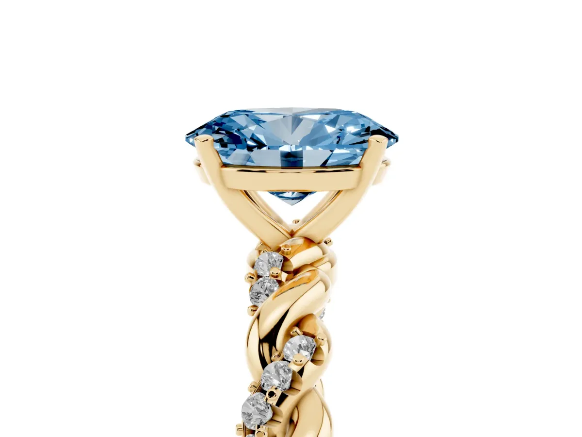 Fancy Blue Oval Cut Diamond Solitaire Ring with Twisted Band and Pavé Accents Yellow gold