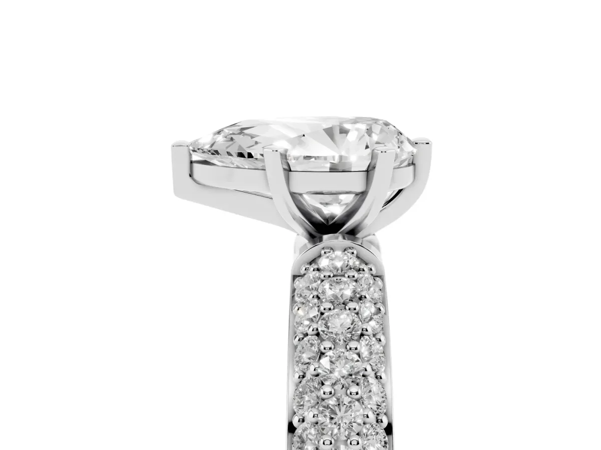 Pear Cut Diamond Solitaire Ring with Prong Setting and Pavé Band Platinum