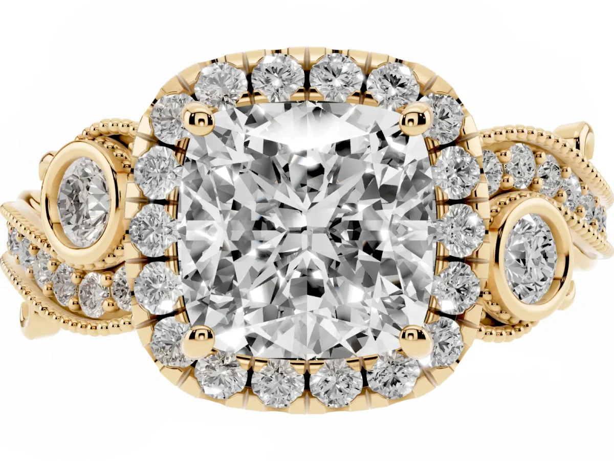 Cushion Cut Halo Diamond Ring with Milgrain and Bezel Accents on a Split Shank Band Yellow gold