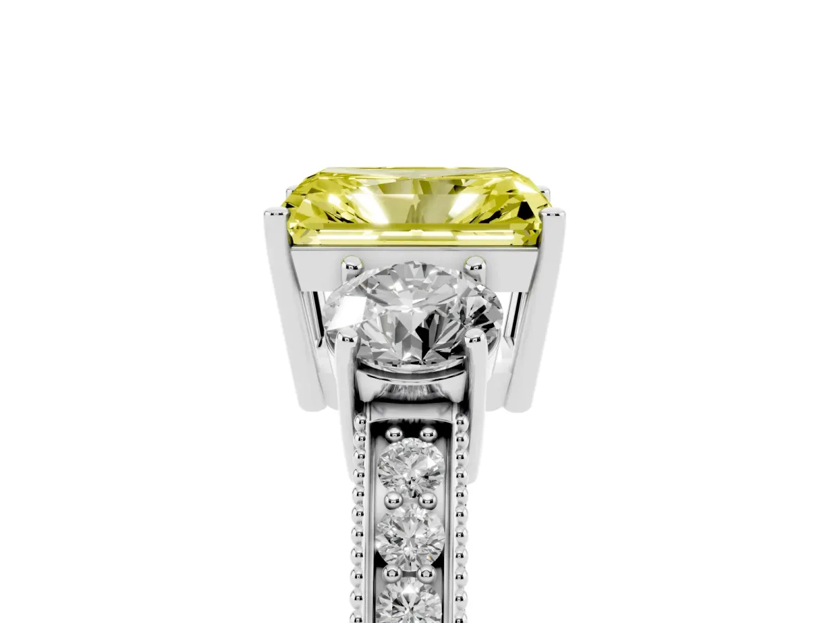 Fancy Yellow Radiant Cut Three-Stone Diamond Ring with Pavé Band and Four-Prong Setting Silver