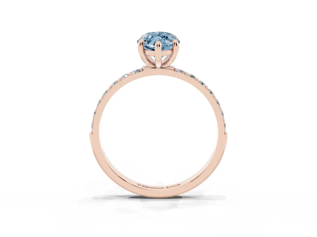Fancy Blue Marquise Cut Diamond Solitaire Ring with Round Pavé Band and Prong Setting Rose gold