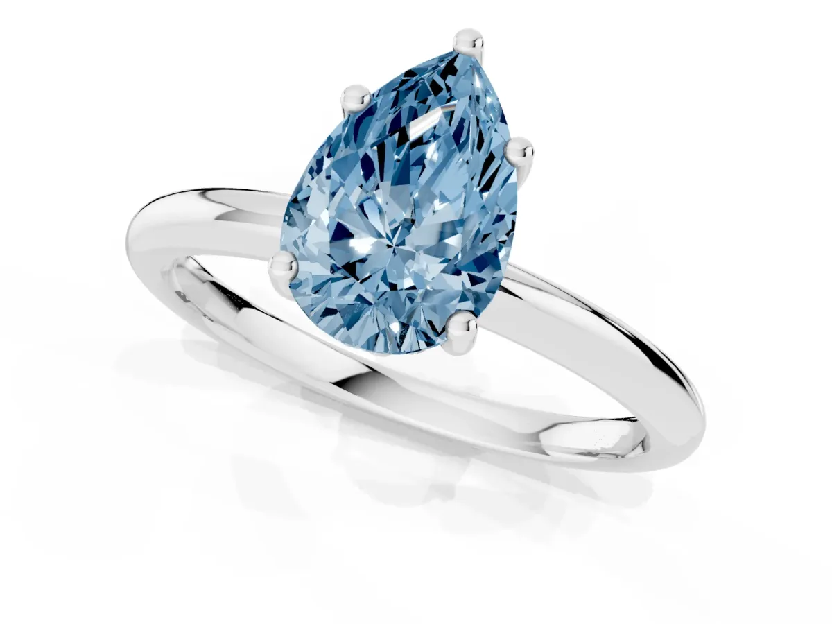 Fancy Blue Pear Cut Cut Solitaire Engagement Ring with Four-Prong Setting and Classic Band Silver