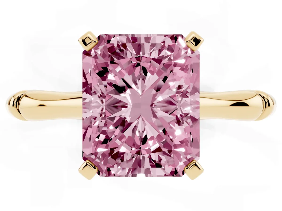 Fancy Pink Radiant Cut Solitaire Diamond Ring with Bamboo Band and Four-Prong Setting Yellow gold