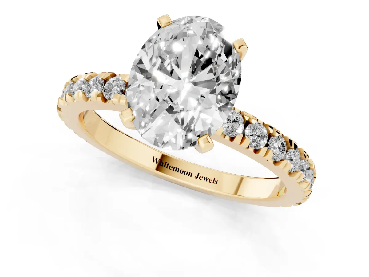 Oval Cut Diamond Pavé Band Solitaire with Four-Prong Setting Yellow gold