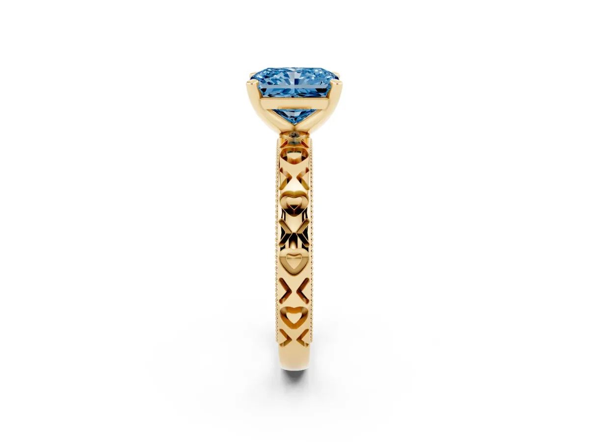 Fancy Blue Radiant Cut Solitaire Diamond Engagement Ring with XO Engraved Band and Four-Prong Setting Yellow gold