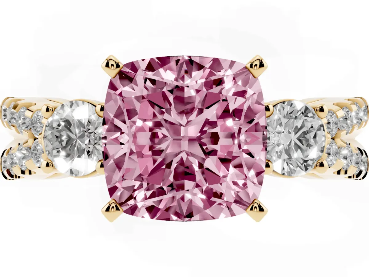 Fancy Pink Cushion Cut Diamond Three-Stone Ring with Pavé Split Shank and Four-Prong Setting Yellow gold