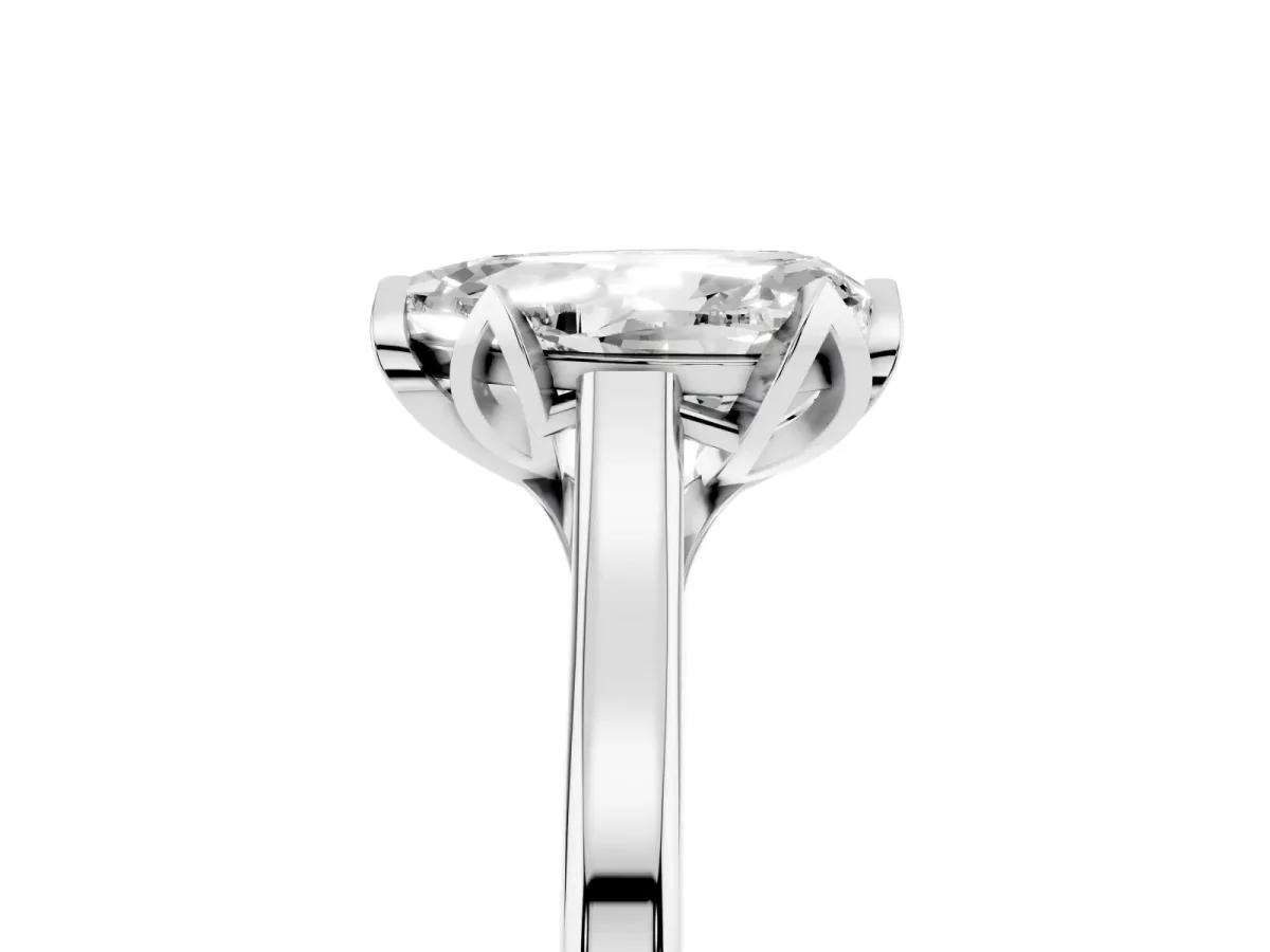 Pear Cut Diamond Solitaire Ring with Flower Prong Setting and Classic Band Silver