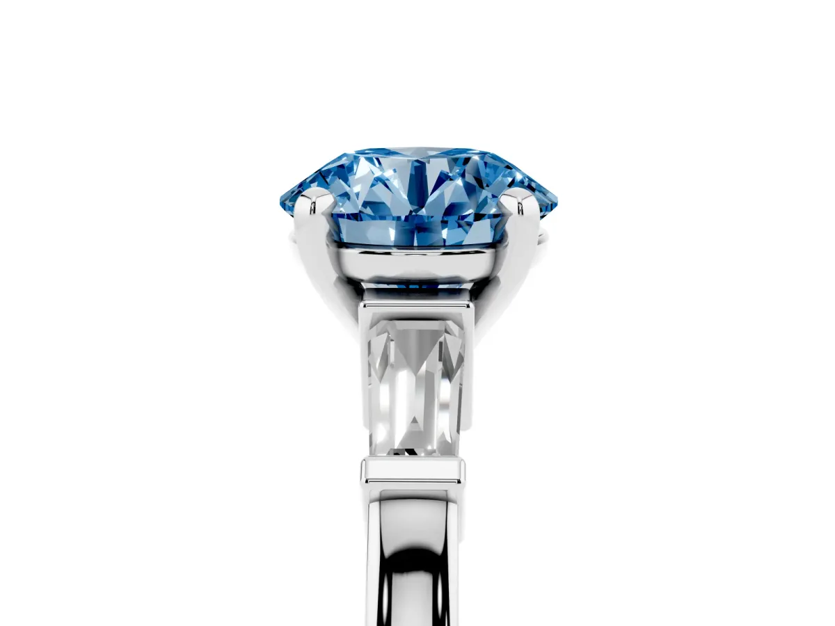 Fancy Blue Round Cut Cut Diamond Solitaire Ring with Tapered Baguette Accents and Four-Prong Setting White gold