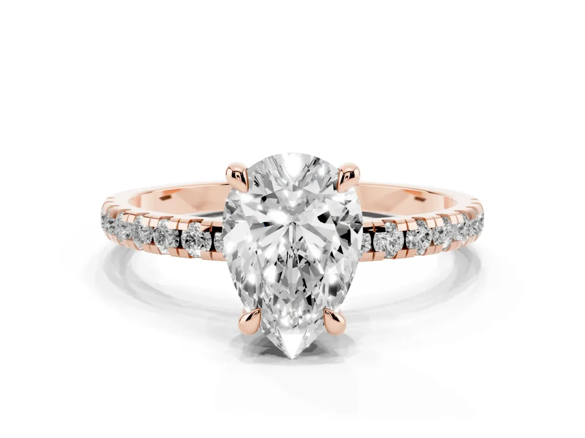 Pear Cut Diamond Brilliant Solitaire Ring with Pavé Band and Four-Prong Setting Rose gold