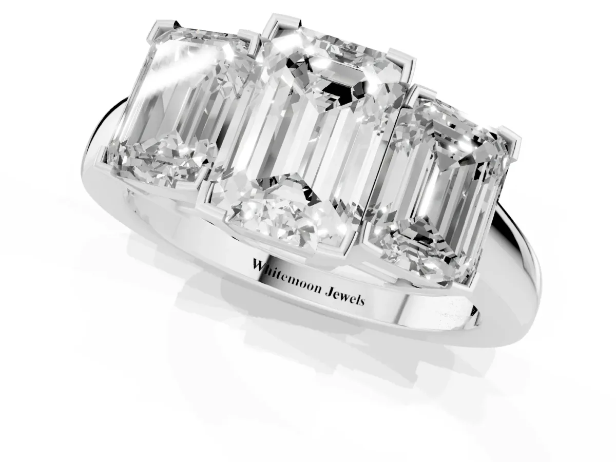 Three-Stone Emerald Cut Cut Diamond Ring with Channel Set Band and Four-Prong Setting Silver