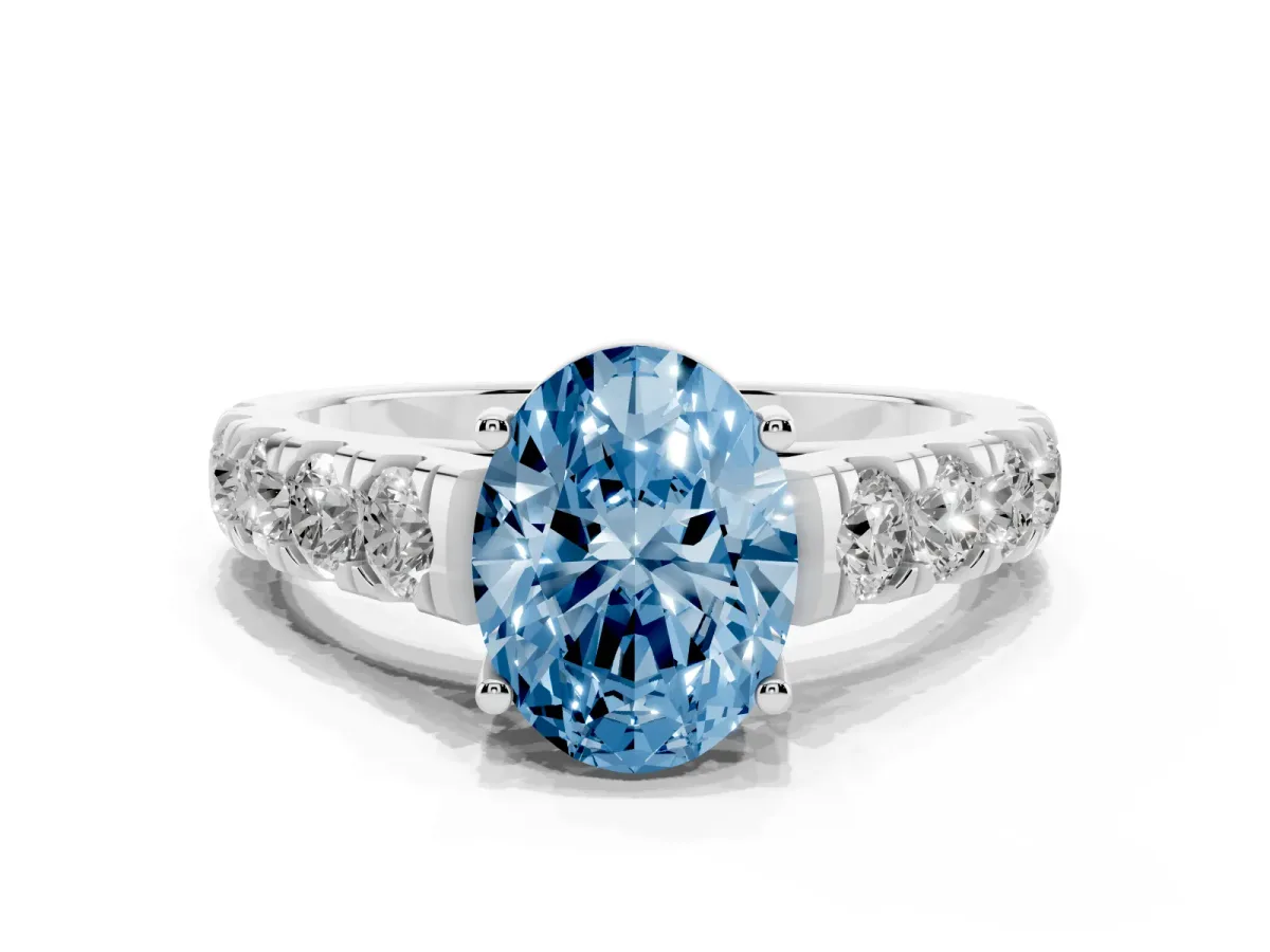 Fancy Blue Oval Cut Cut Diamond Solitaire Ring with Micro Pave Band and Prong Setting Silver