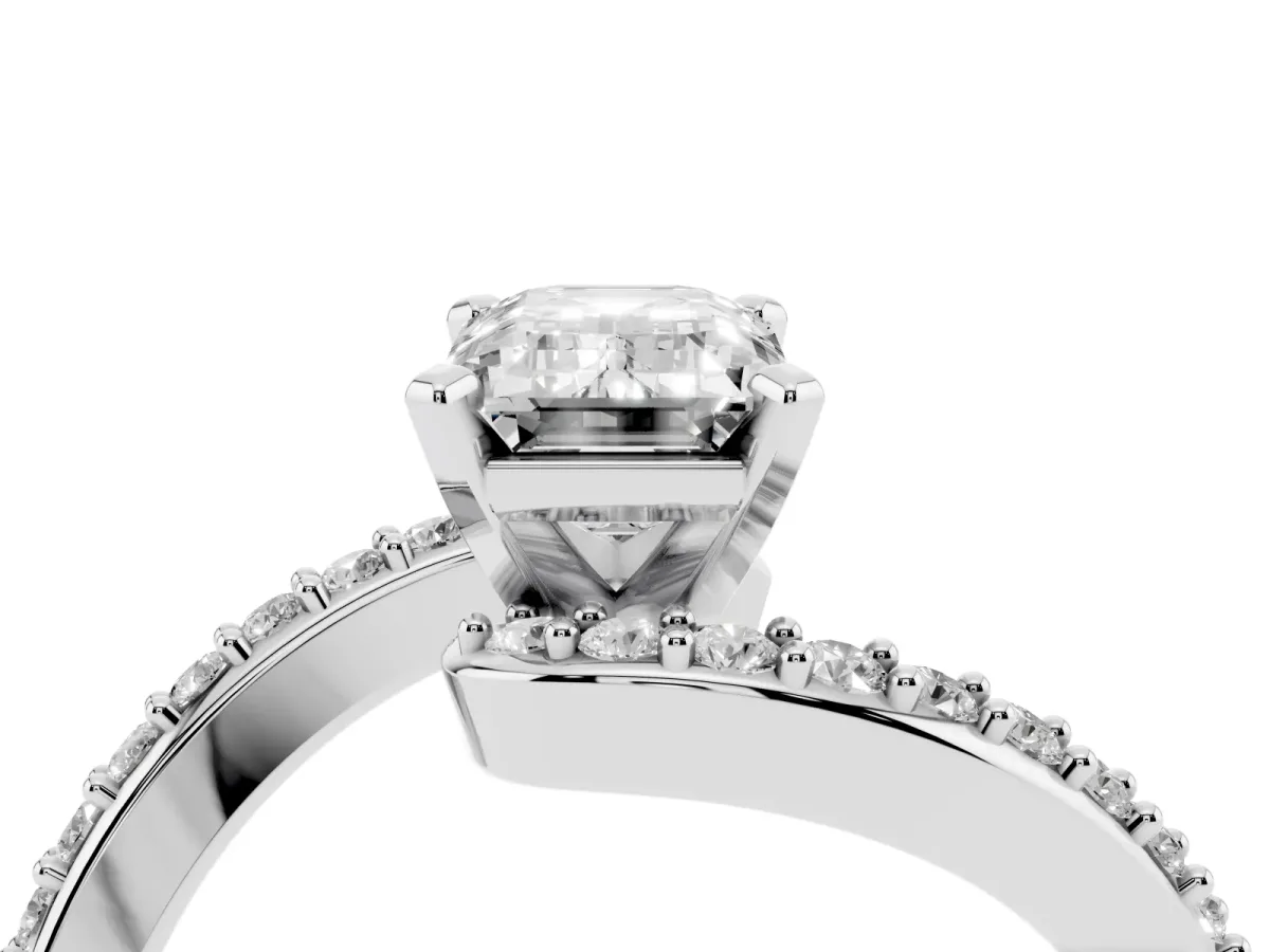 Emerald Cut Solitaire Twist Band with Pave Set Diamonds and Four-Prong Setting Silver