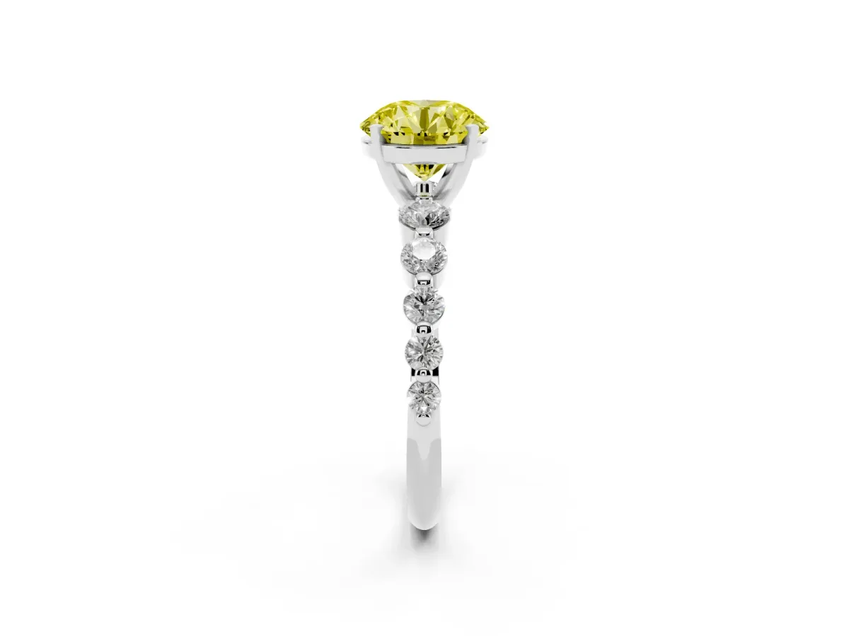 Fancy Yellow Round Cut Solitaire Diamond Ring with Pave Band and Four-Prong Setting Silver