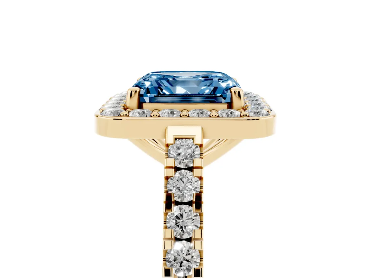 Fancy Blue Asscher Cut Diamond Halo Ring with Round Pavé Split Shank and Prong Setting Yellow gold