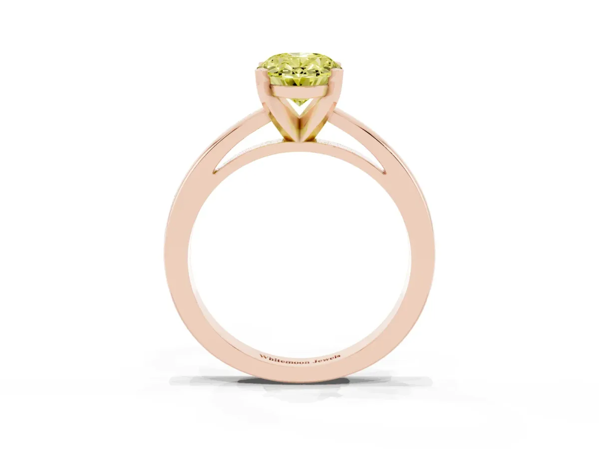 Fancy Yellow Oval Cut Solitaire Diamond Engagement Ring with Four-Prong Setting on a Classic Band Rose gold