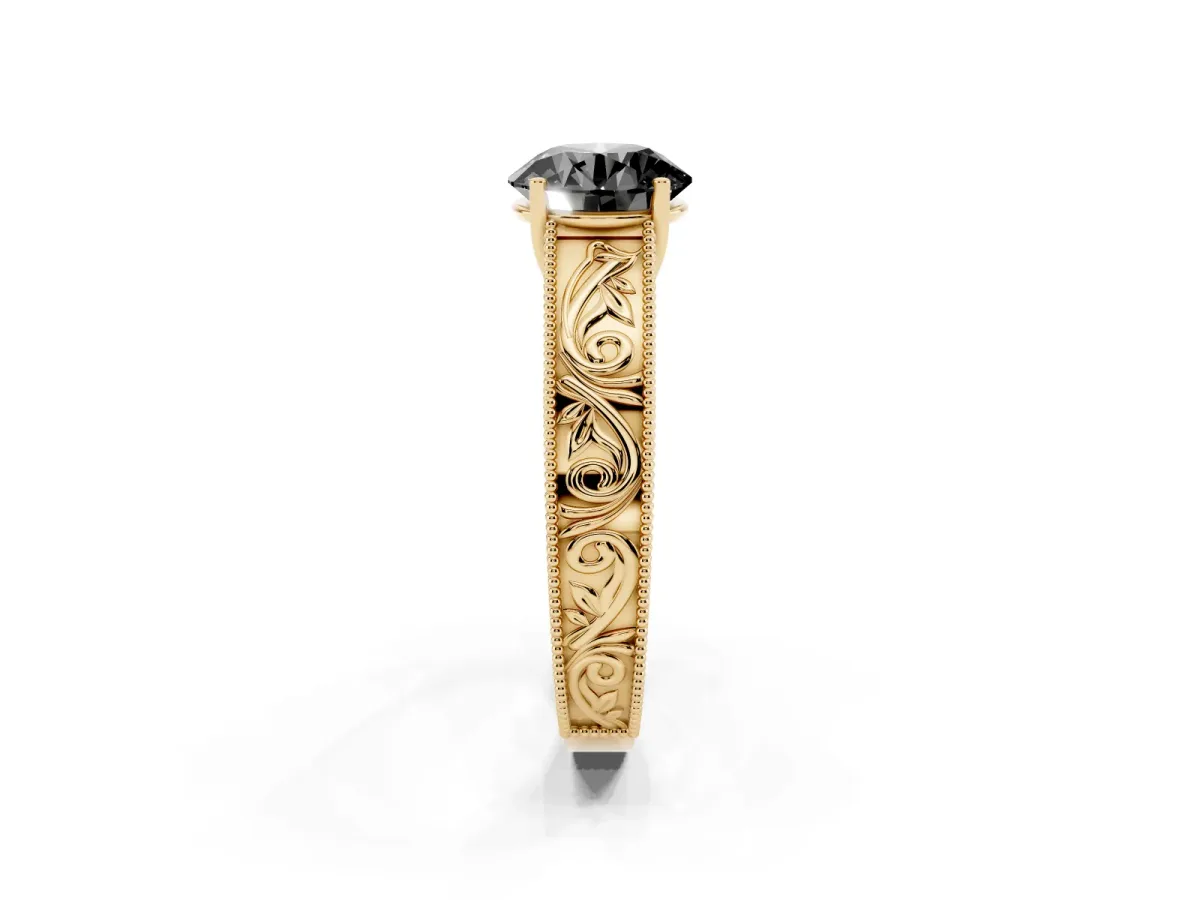 Fancy Black Round Cut Diamond Solitaire Ring with Engraved Band and Four-Prong Setting Yellow gold
