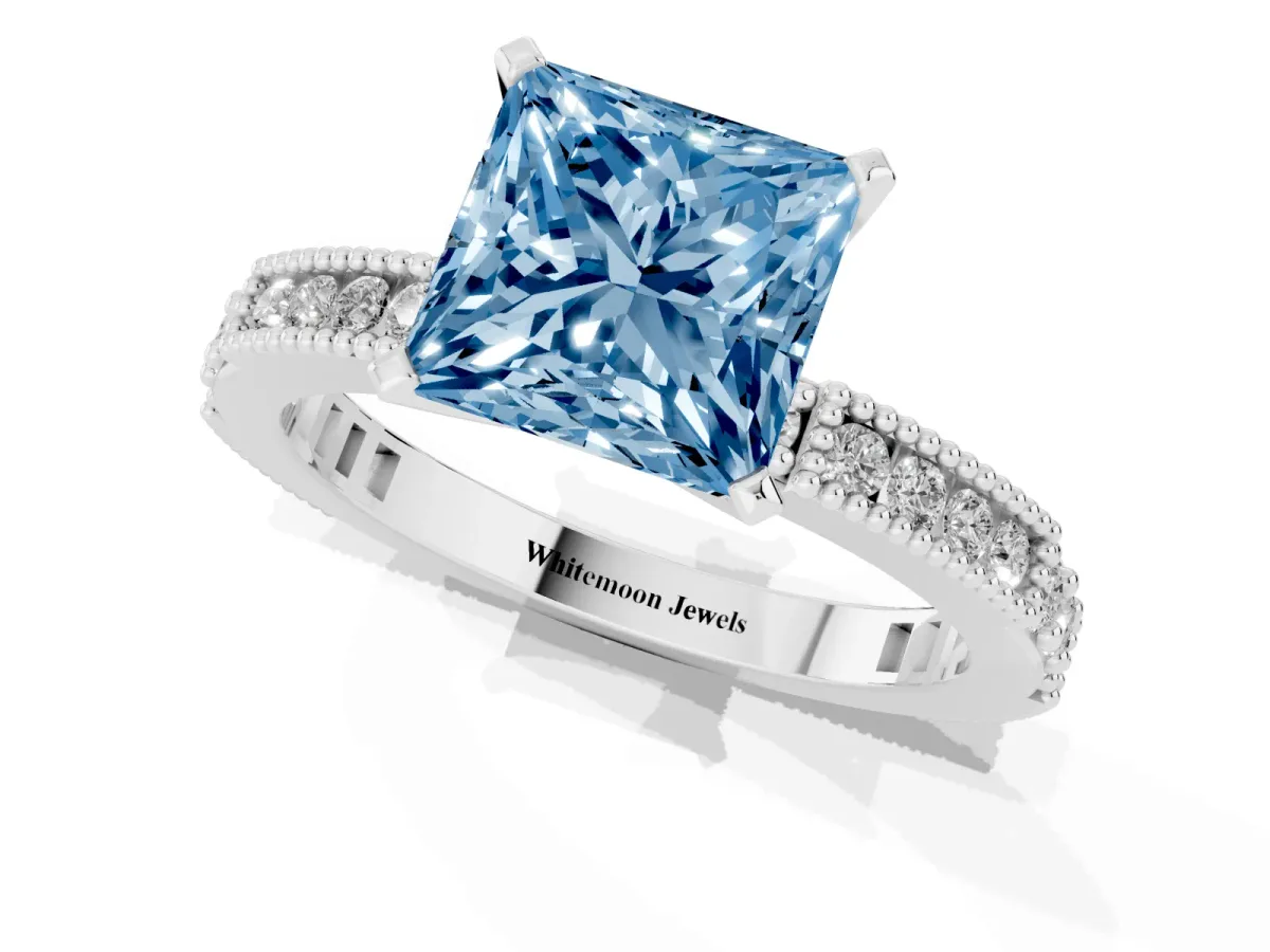 Fancy Blue Princess Cut Solitaire with Pavé Band and Four-Prong Setting Silver