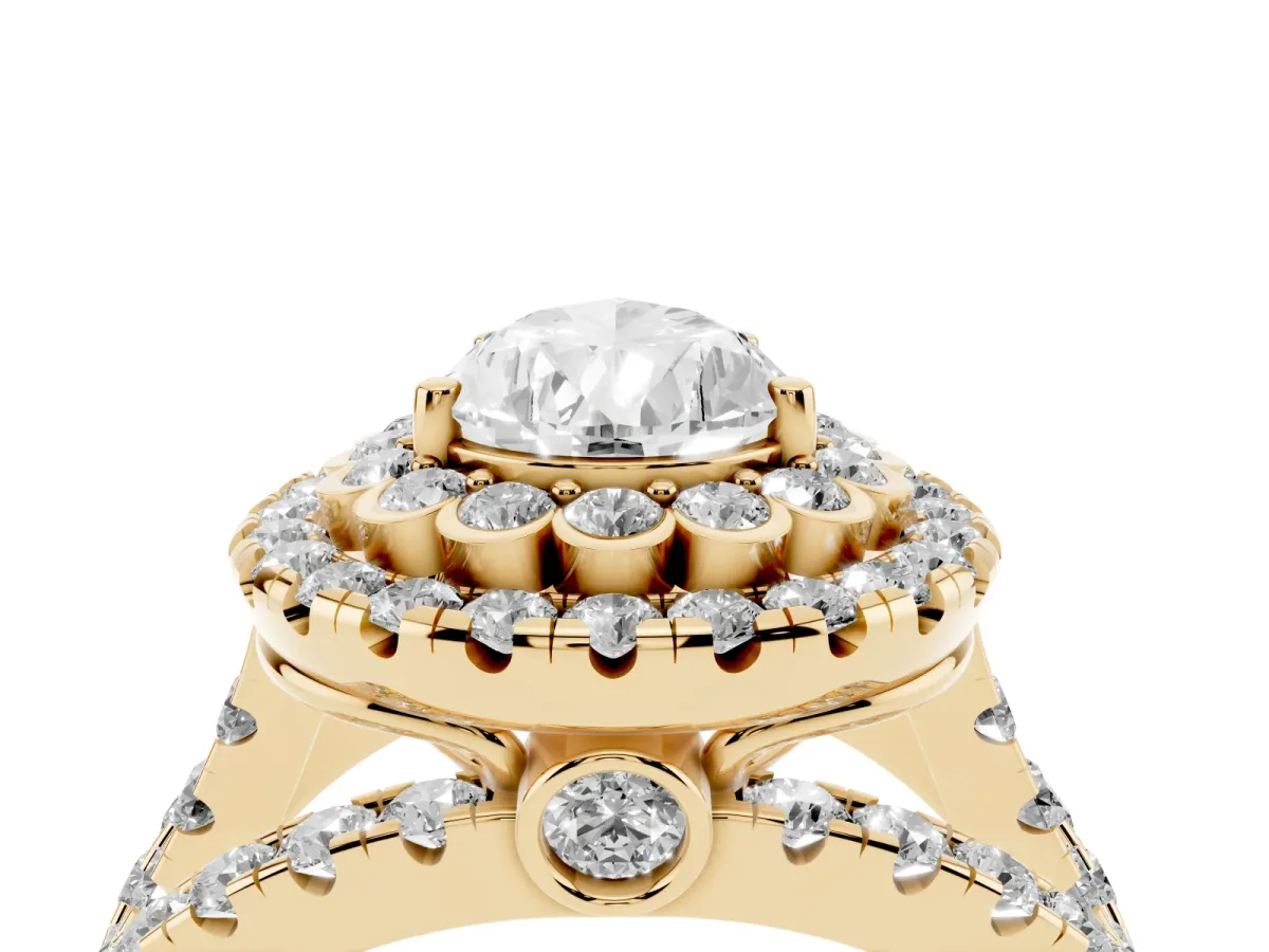Pear Cut Diamond Double Halo Ring with Round Pavé Split Shank and Prong Setting Yellow gold