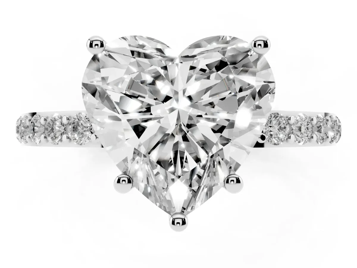 Heart Cut Diamond Solitaire Ring with Round Pavé Shoulders and Prong Setting Silver