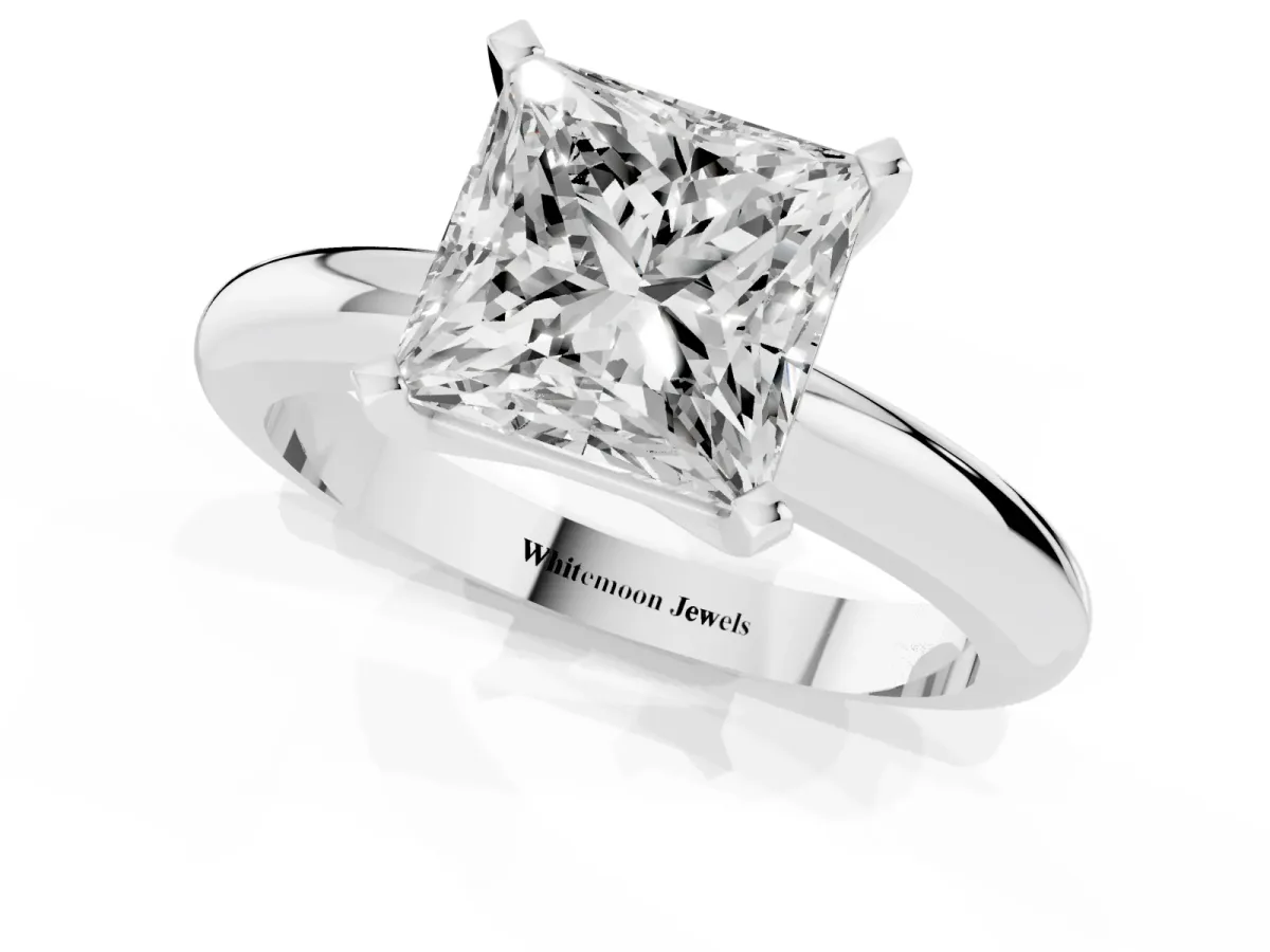 Princess Cut Diamond Solitaire Engagement Ring with Round Band and Four-Prong Setting Silver