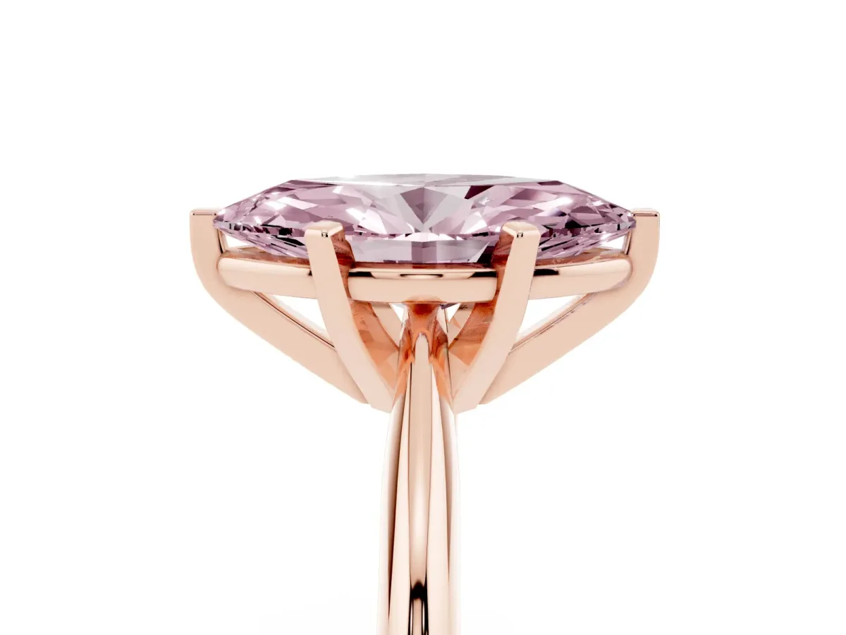 Fancy Pink Marquise Cut Cut Solitaire Ring with Four-Prong Setting on a Classic Band Rose gold