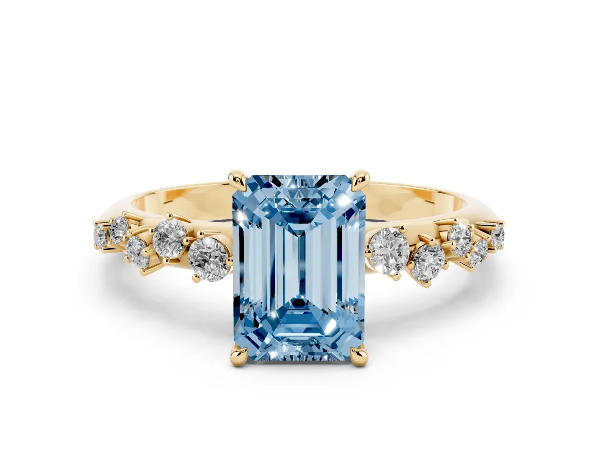 Fancy Blue Emerald Cut Diamond Cluster Side Stone Solitaire Ring with Prong Setting Yellow gold