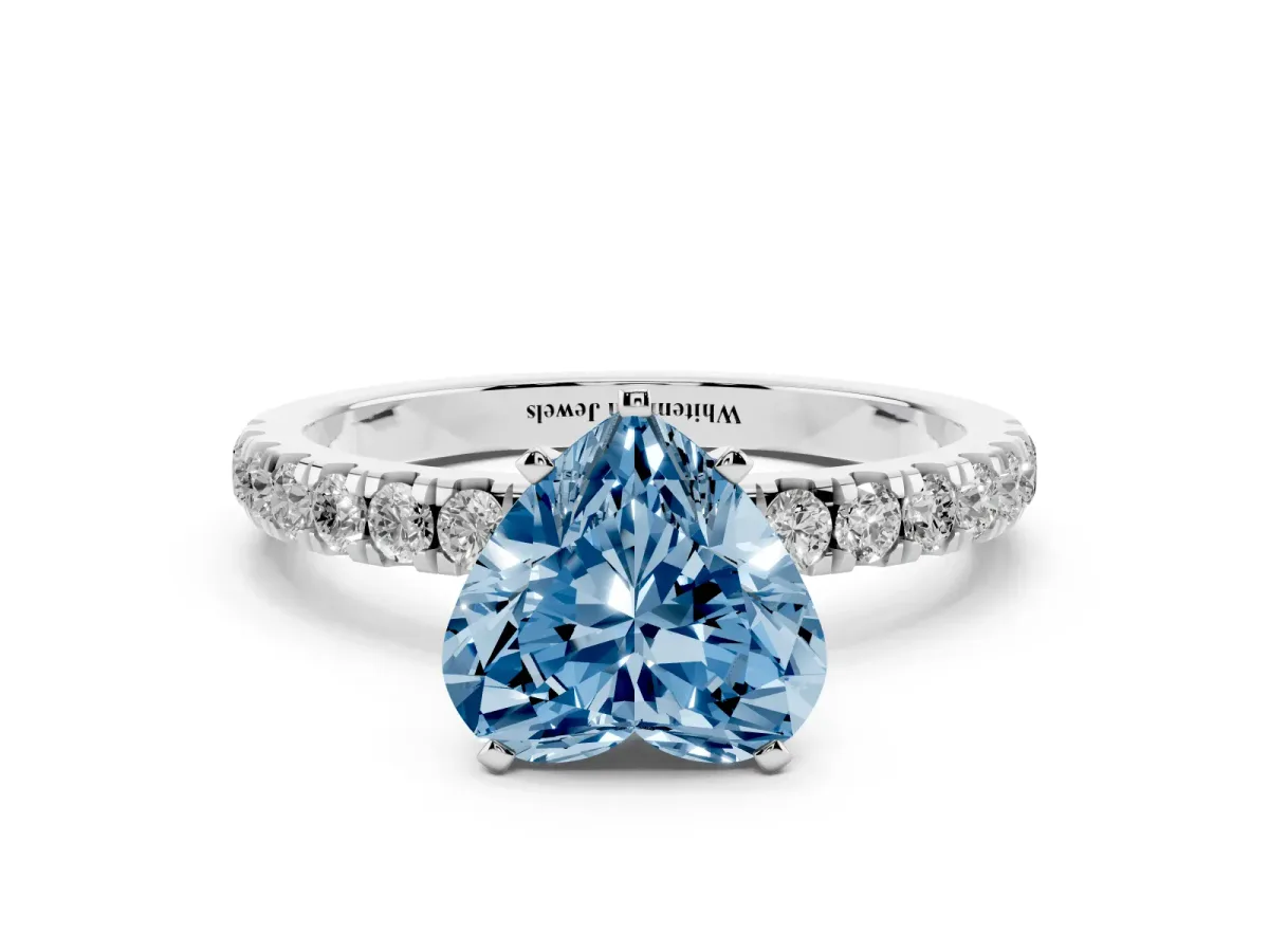 Fancy Blue Heart Cut Diamond Solitaire Ring with Pavé Accents and Four-Prong Setting Silver
