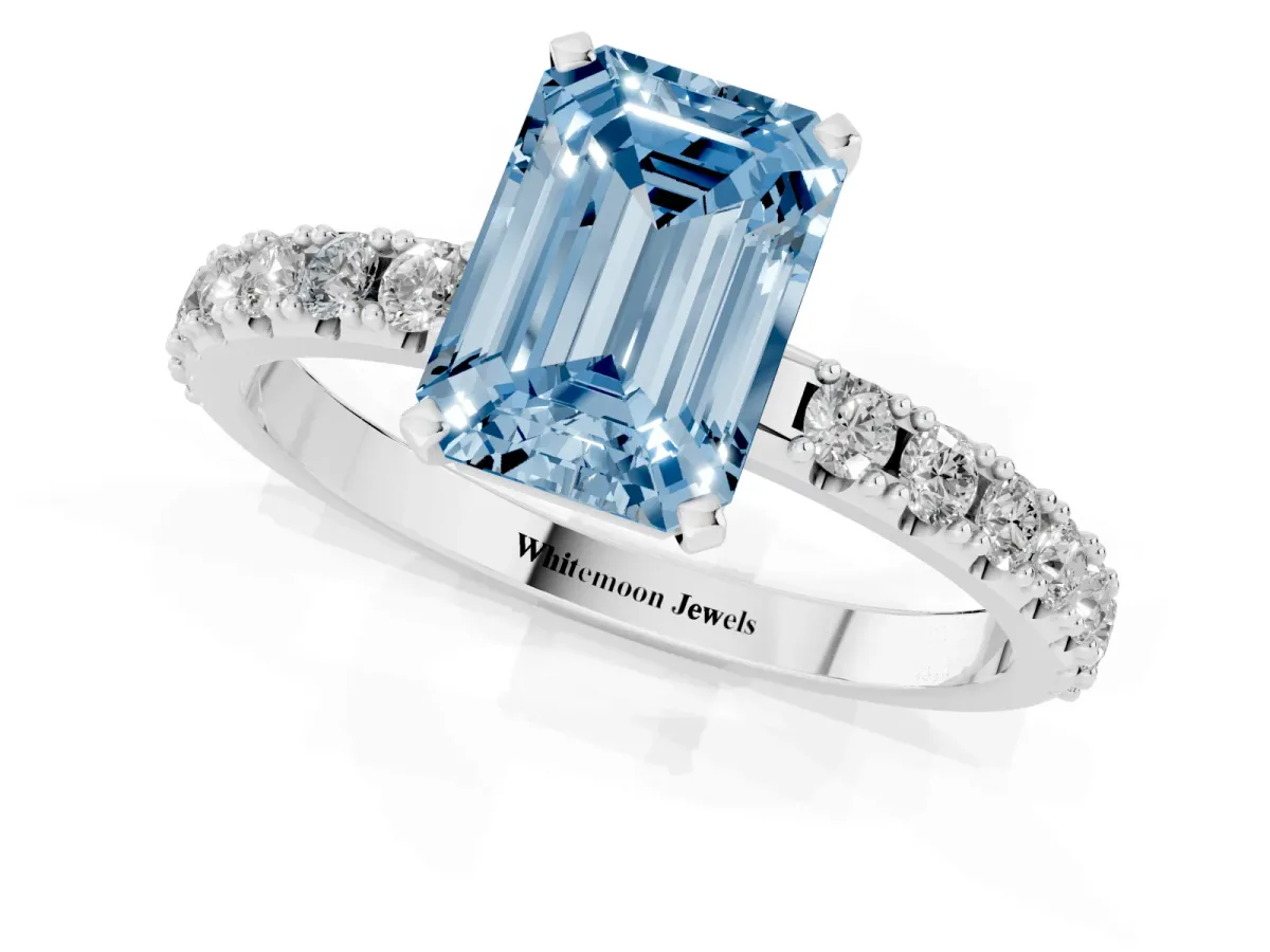 Fancy Blue Emerald Cut Diamond Solitaire Pavé Band with Four-Prong Setting Platinum