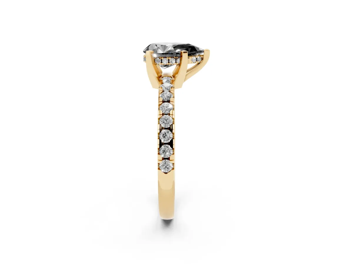 Fancy Black Pear Cut Diamond Solitaire Ring with Round Pavé Band and Four-Prong Setting Yellow gold