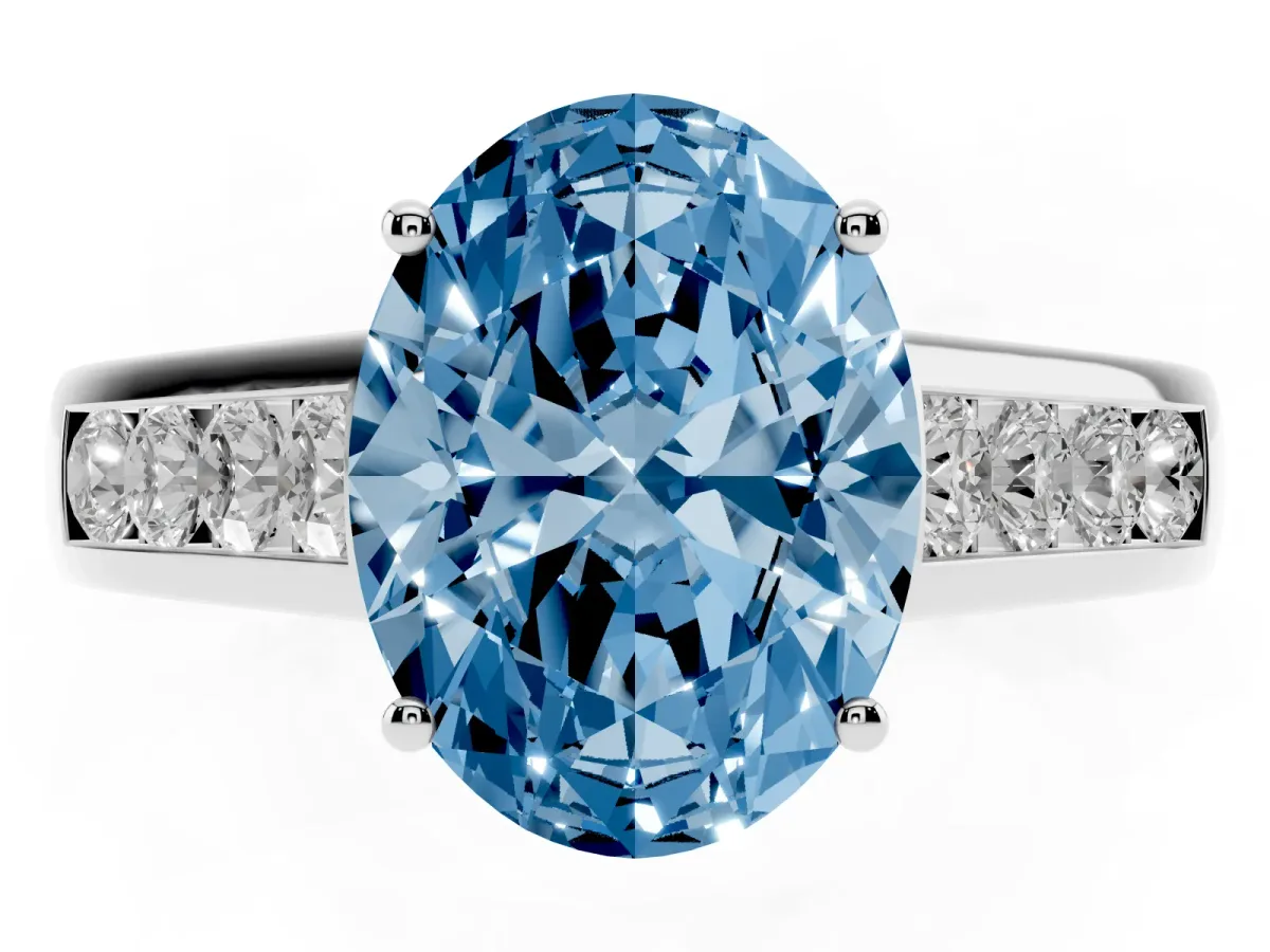 Fancy Blue Oval Cut Solitaire Channel-Set Diamond Engagement Ring with Four-Prong Setting Silver