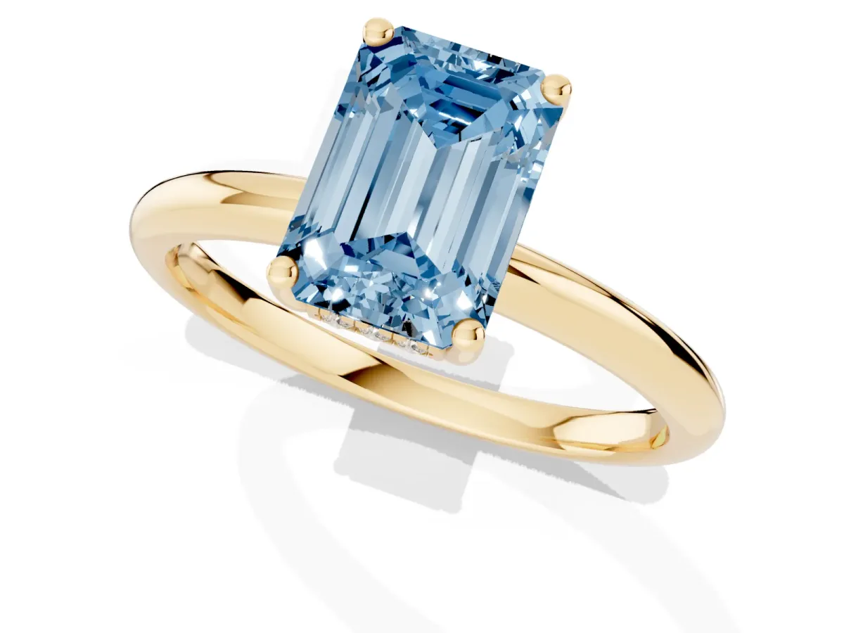 Fancy Blue Emerald Cut Cut Solitaire Engagement Ring with Four-Prong Setting and Classic Band Yellow gold