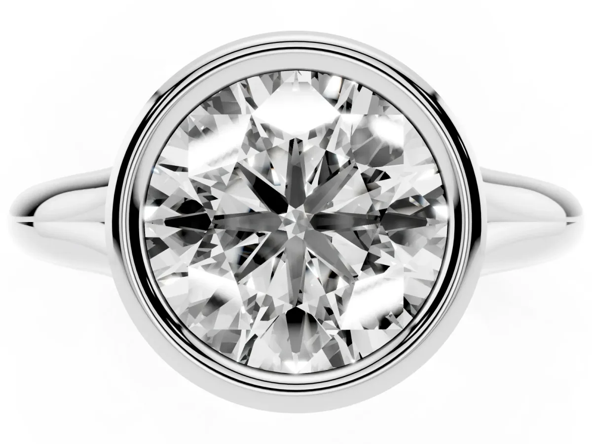 Bezel Set Round Cut Solitaire Diamond Ring with Smooth Band Platinum