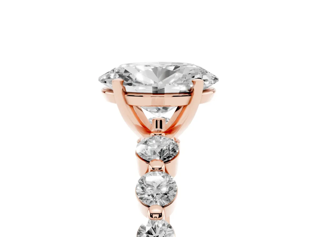 Oval Cut Solitaire Diamond Ring with Pave Band and Four-Prong Setting Rose gold
