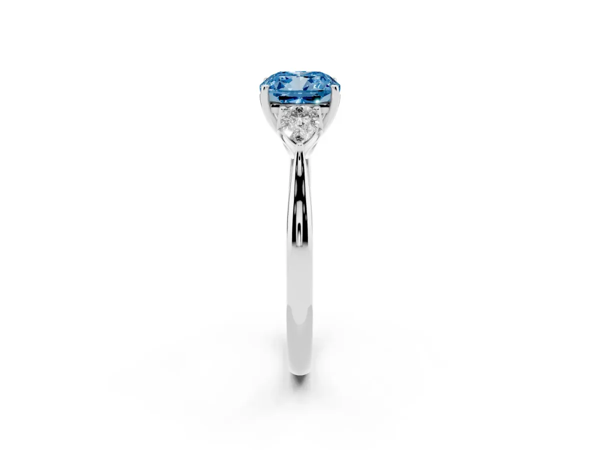 Fancy Blue Three-Stone Cushion Cut Brilliant Diamond Solitaire Ring with Tapered Band and Four-Prong Setting Silver
