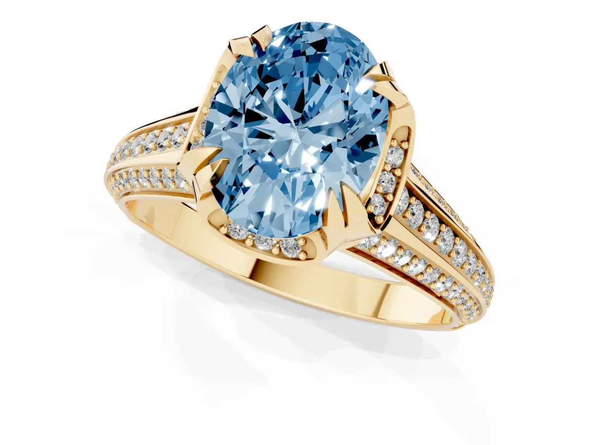 Fancy Blue Oval Cut Solitaire Pave Split Shank Ring with Four-Prong Setting Yellow gold