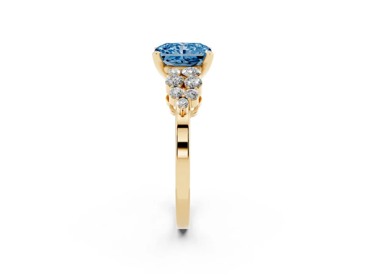 Fancy Blue Radiant Cut Cluster Diamond Engagement Ring with Pavé Band and Four-Prong Setting Yellow gold