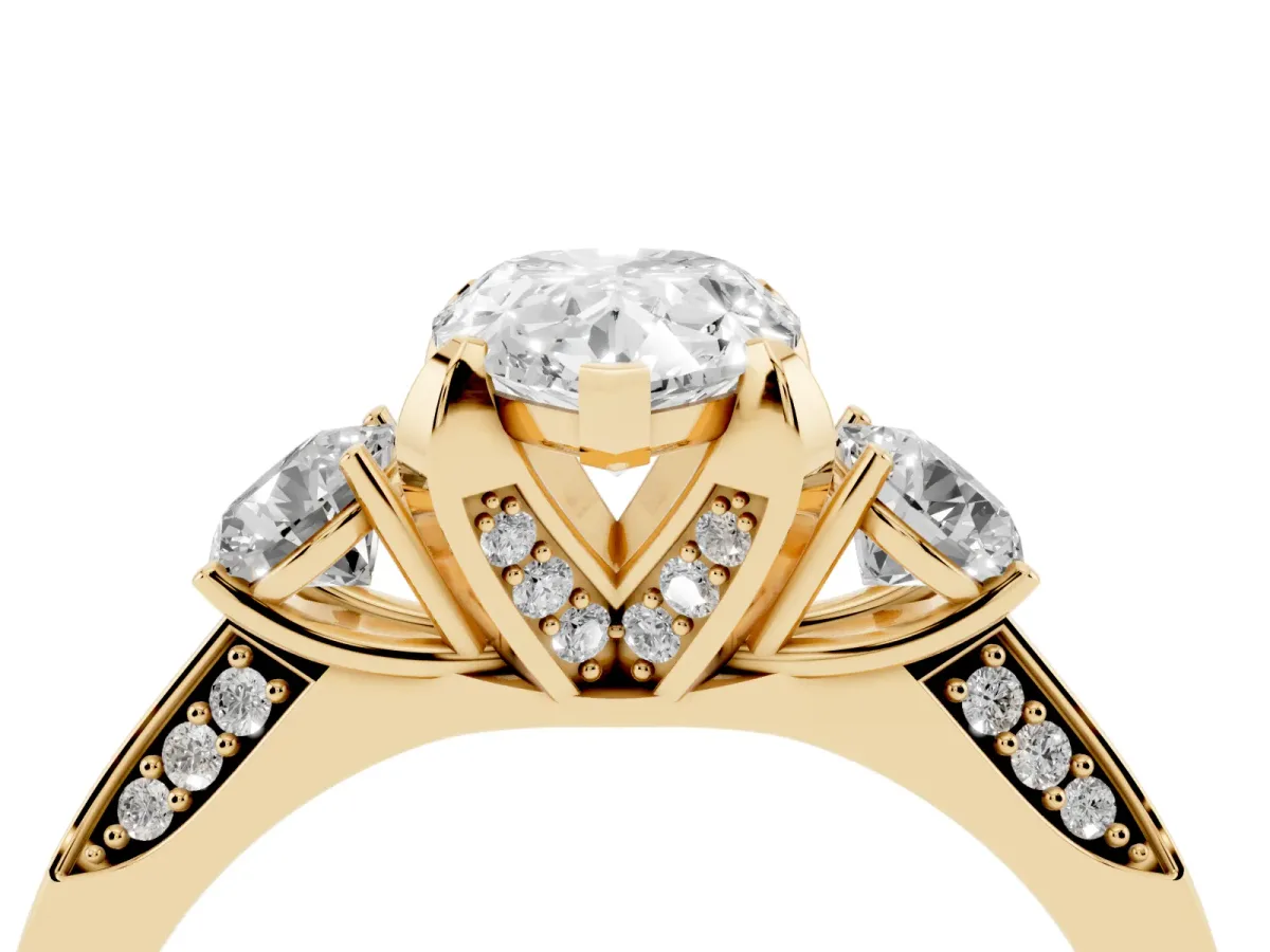 Pear Cut Brilliant Three-Stone Diamond Ring with Pavé Band and Four-Prong Setting Yellow gold