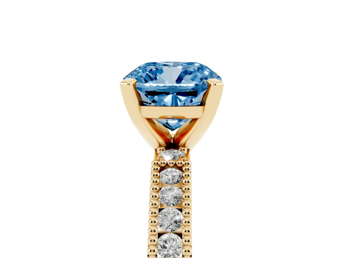 Fancy Blue Cushion Cut Solitaire with Pavé Band and Four-Prong Setting Yellow gold