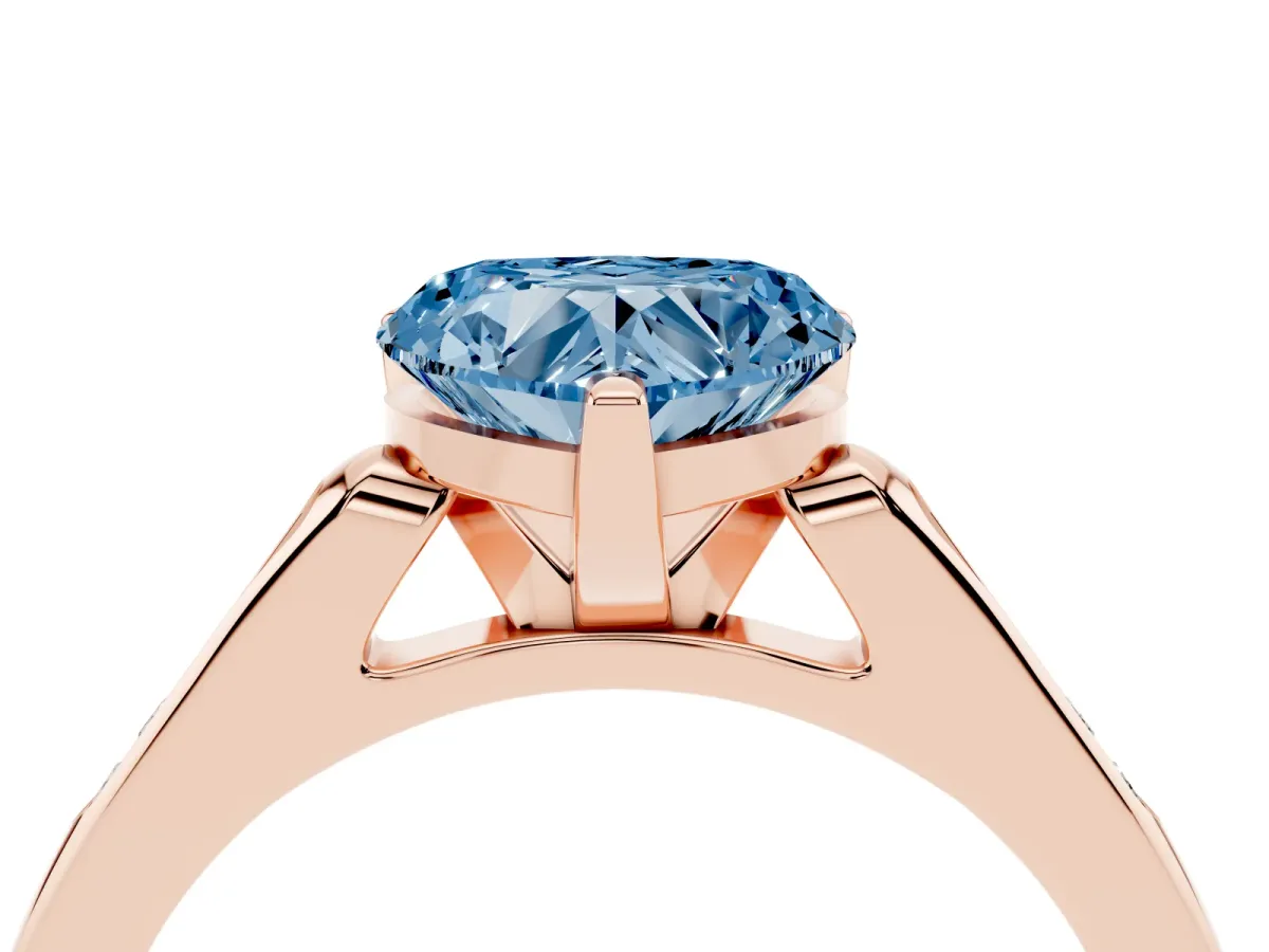 Fancy Blue Heart Cut Diamond Solitaire Ring with Channel Set Round Band and Prong Setting Rose gold