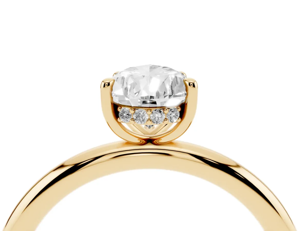 Pear Cut Diamond Solitaire Ring with Thin Band and Four-Prong Setting Yellow gold