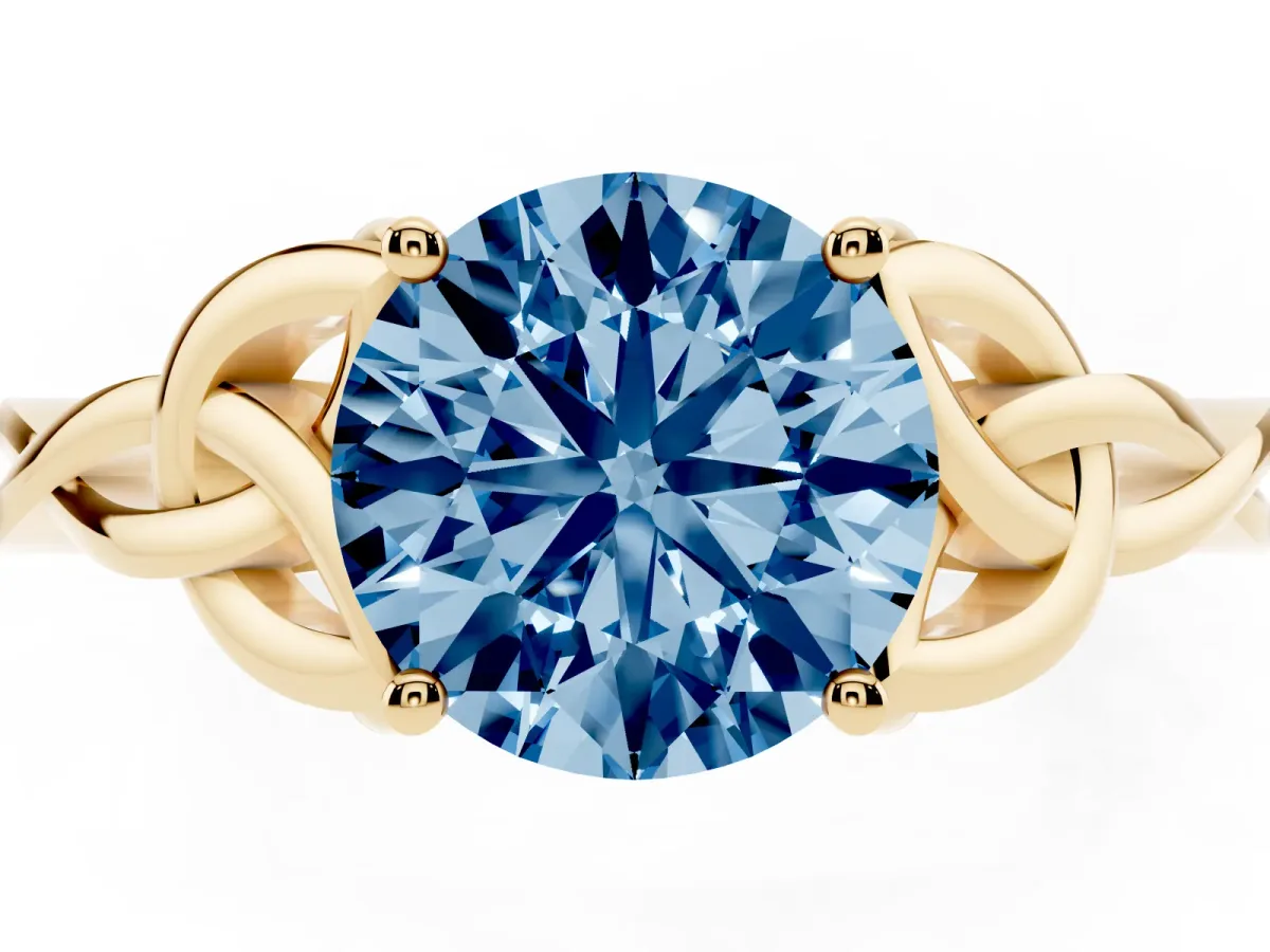 Fancy Blue Round Cut Diamond Solitaire Engagement Ring with Celtic Knot Band and Four-Prong Setting Yellow gold