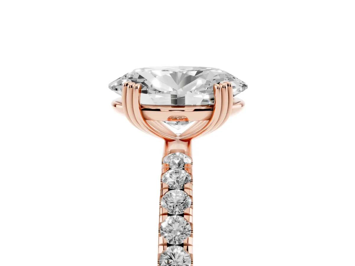 Oval Cut Brilliant Solitaire with Pavé Band and Claw Prong Setting Rose gold