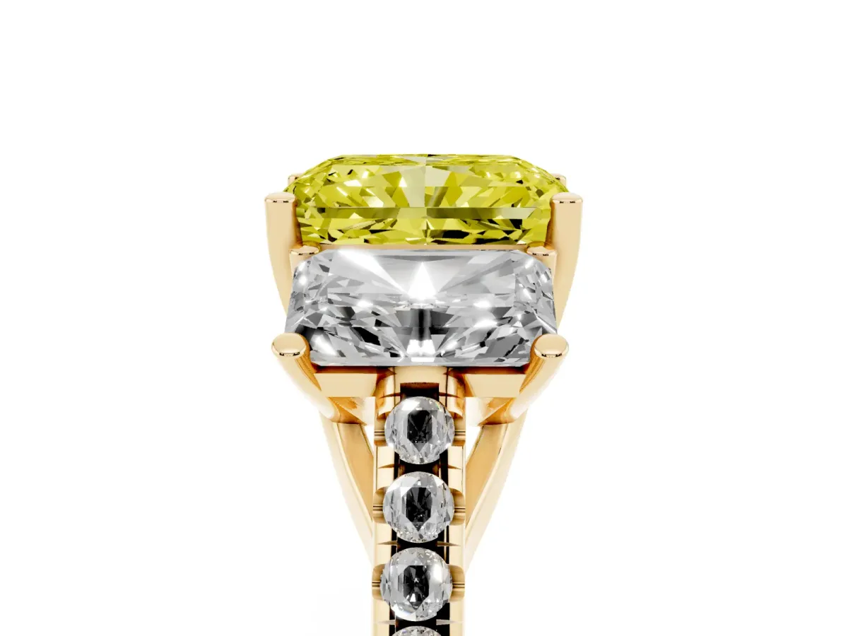 Fancy Yellow Three-Stone Radiant Cut Diamond Ring with Round Pavé Band and Prong Setting Yellow gold