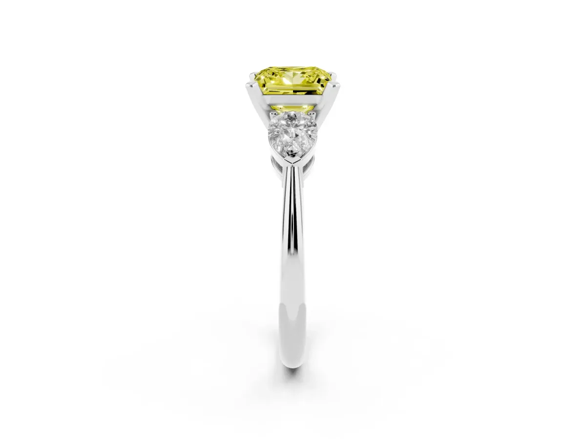 Fancy Yellow Three-Stone Princess Cut Diamond Ring with Pear Side Stones and Four-Prong Setting Silver