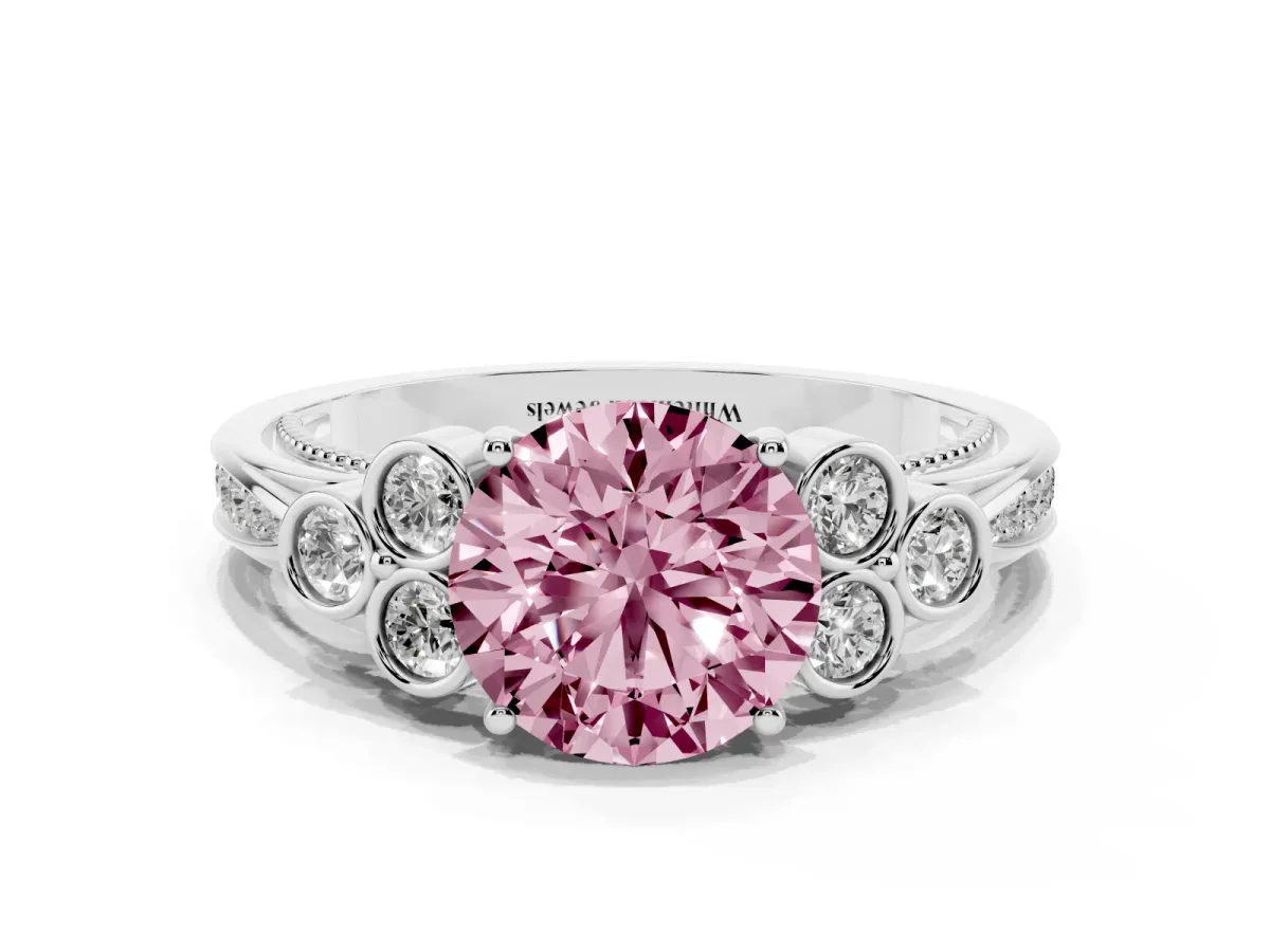 Fancy Pink Round Cut Cut Diamond Engagement Ring with Bezel Set Round Side Stones and Prong Setting Silver